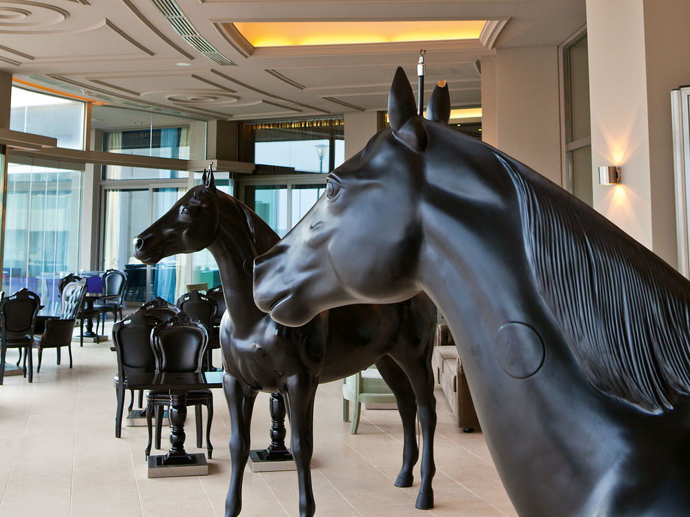 Grecotel Astir Palace Alexandroupoli Exterior photo The sculpture in the Hong Kong Jockey Club headquarters